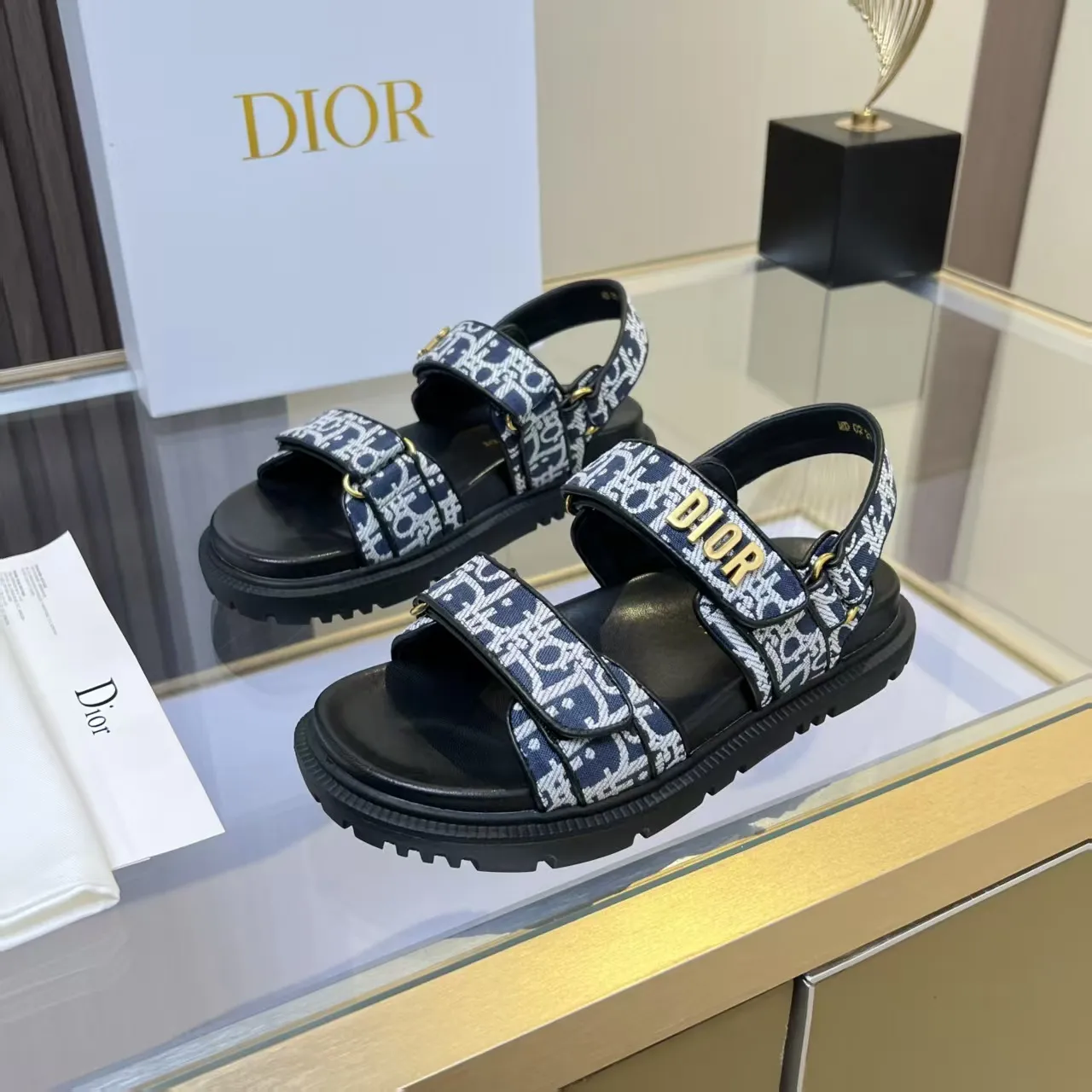 👟👟Ex-factory price 480👟👟 Dior classic popular sandals Step into the fashion territory of Dior slippers and encounter the ultimate fusion of elegance and comfort. The upper is engraved with the Christian Dior Paris logo using exquisite embroidery technology. The delicate stitching tells the brand's profound heritage and is fully recognizable.   Made of high-quality materials, it feels soft and fits your feet, as if it is a gentle care tailor-made for your feet. The sole is carefully designed and engraved with Christian Dior's lucky star symbol. It is not only a beautiful embellishment, but also provides reliable grip, making every step steady and secure.   It has a simple design and is easy to put on and take off. Whether it is a lazy weekend or a pleasant vacation, it can be easily adapted. Whether paired with casual shorts, casual jeans, or an elegant dress, Dior slippers can instantly enhance the overall style and show a casual fashion attitude.   Dior slippers, in the name of fashion, inject luxurious charm into your life and accompany you with every step you take with confidence and elegance. Material: Fine genuine cowhide upper, outsole, TPR, non-slip and wear-resistant, code number: 35-41 (42 customized)